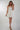 Magasinez la robe mini avec haut élastique de Colori - Shop the elastic top mini dress from Colori