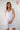 Magasinez la robe courte à volants de Colori - Shop the short ruffled dress from Colori