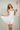 Magasinez la robe multicouches à dos ouvert de Colori - Shop the multilayered dress with open back from Colori