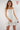 Magasinez la robe courte à volants from Colori - Shop the short ruffled dress from Colori