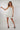Magasinez la robe courte à volants from Colori - Shop the short ruffled dress from Colori