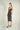 Magasinez la robe midi brillante de Colori - Shop the shiny midi dress from Colori