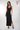 Magasinez la robe maxi brillante de Colori - Shop the shiny maxi dress from Colori