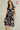 Magasinez la robe portefeuille sans manches de Colori - Shop the sleeveless wrap dress from Colori