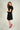 Magasinez la robe cache-coeur à manches courtes de Colori - Shop the short sleeve wrap dress from Colori