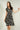Magasinez la robe portefeuille à manches courtes de Colori - Shop the short sleeve wrap dress from Colori