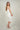 Magasinez la robe portefeuille midi de Colori - Shop the wrap midi dress from Colori