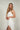 Magasinez la robe portefeuille midi de Colori - Shop the wrap midi dress from Colori