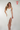 Magasinez la robe portefeuille midi de Colori - Shop the wrap midi dress from Colori
