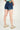 Magasinez le short en denim de Colori - Shop the denim short from Colori