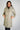 Magasinez le long manteau beige bouffant de chez Colori - Shop the long beige puffer jacket from Colori