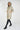 Magasinez le long manteau beige bouffant de chez Colori - Shop the long beige puffer jacket from Colori